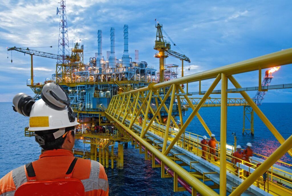 worker and offshore rig background.